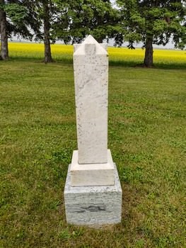 Granite double monument — before restoration